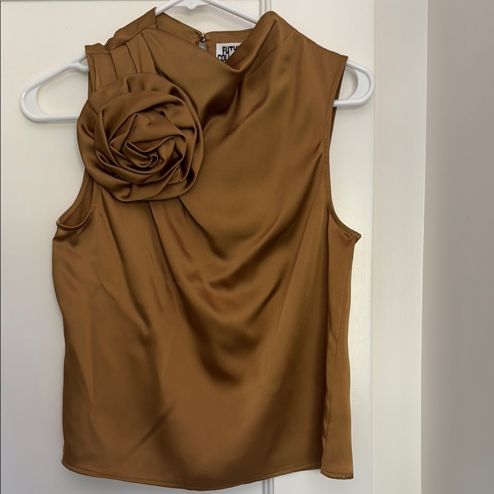 Elegant Brown Sleeveless Top with Floral Detail